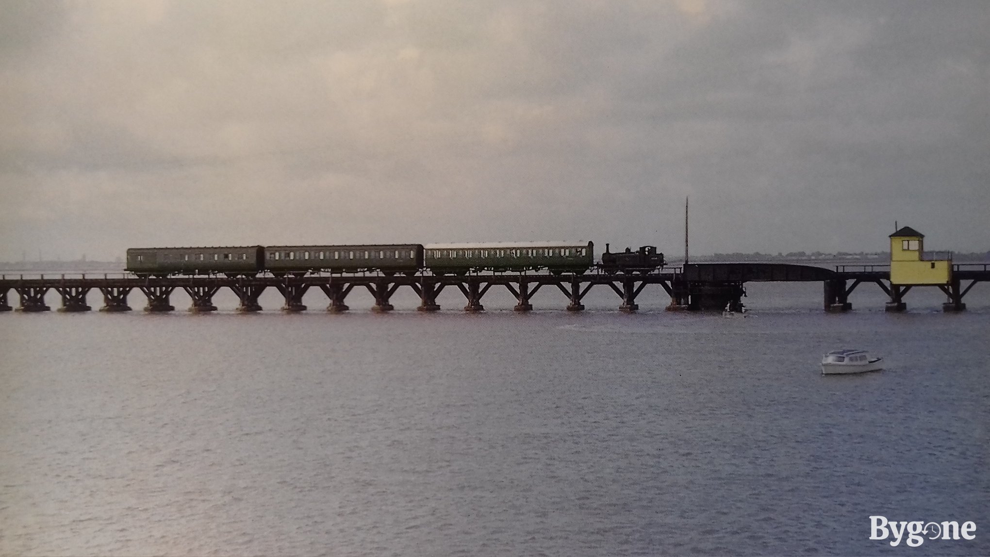 Hayling Billy traversing railway bridge, Hayling Island