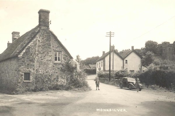 Monksilver, car by house